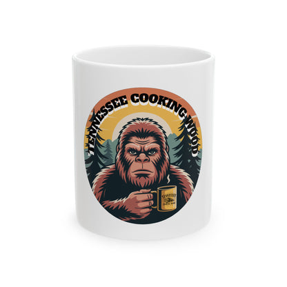 Bigfoot Needs Coffee Mug — Sasquatch Holding Coffee Cup Retro Forest 11oz