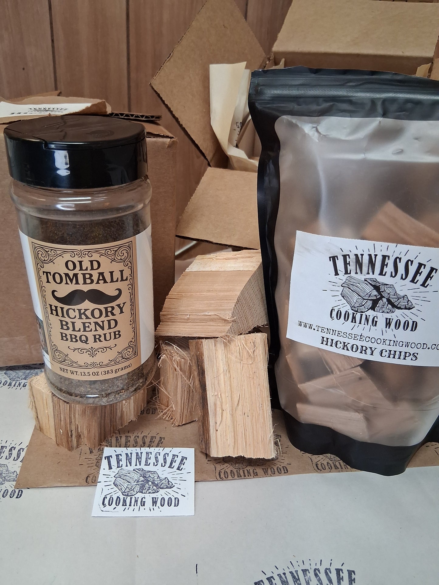 Tennessee cooking wood chips and Old Town Hickory Rub on a cardboard surface