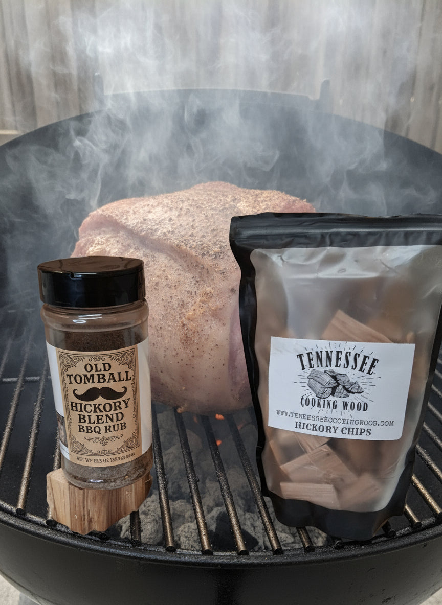Tennessee Cornish Game Hens packaging with Old Tomball Hickory Blend seasoning on a woodchunk from Tennessee Cooking Wood