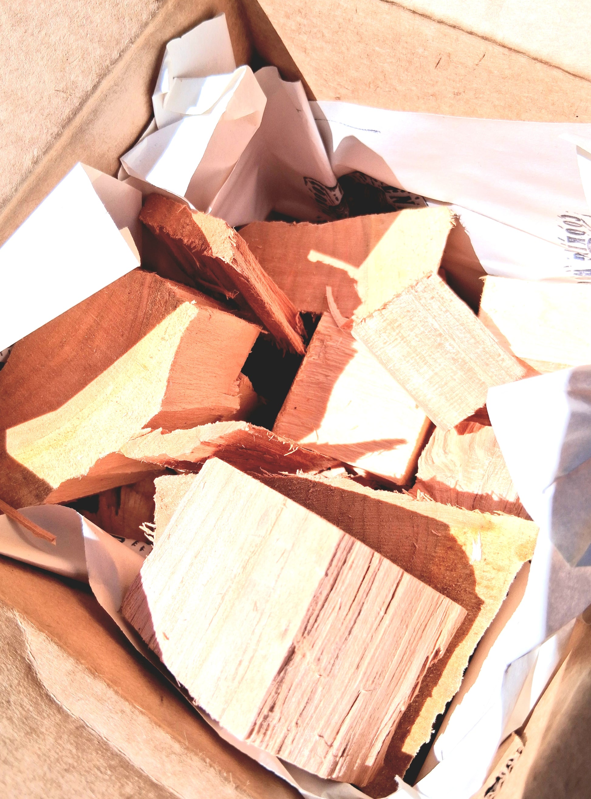 Wooden blocks in a cardboard box